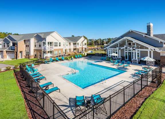 Entertainment Lounge By Pool at Leland Station Apartments, Leland, NC, 28451