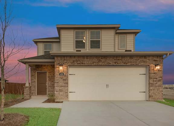 A House With Garage and a Driveway at Cottages at Beltmill Apartments, Texas