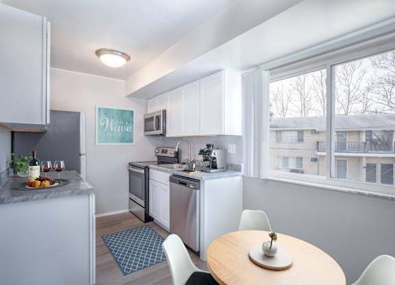 Kitchen with Dining Area at Versailles, 25026 E Rue Versailles, Oak Park