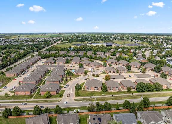 A suburban neighborhood with houses and streets.