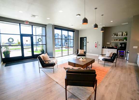 A modern living room with a view of the outside.