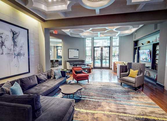 Clubroom With Smart Tv And Fireplace at Civic at Frisco Square Apartments, Frisco, TX