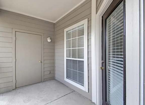 A white door is on the left and a black door is on the right.