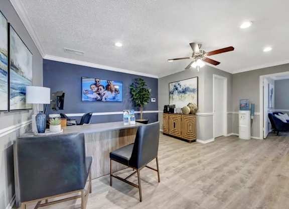 Leasing office with modern furnishings and decor at South Meadows Apartments, Red Oak, 75154