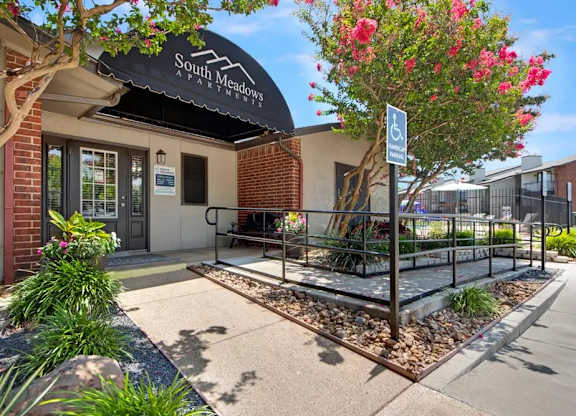 Accessible entrance with handicap parking and ramp at South Meadows Apartments, Texas, 75154