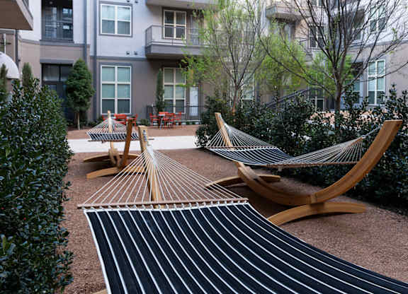 Courtyard with hammock in backyard at Civic at Frisco Square Apartments, Frisco, 75034