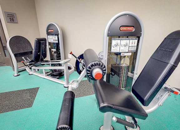 Row of exercise machines in fitness center at Civic at Frisco Square Apartments, Frisco, TX, 75034
