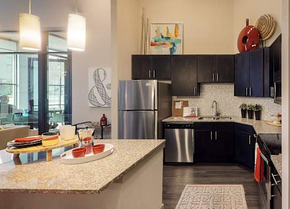 Fully Equipped Kitchen With Modern Appliances at Civic at Frisco Square Apartments, Texas