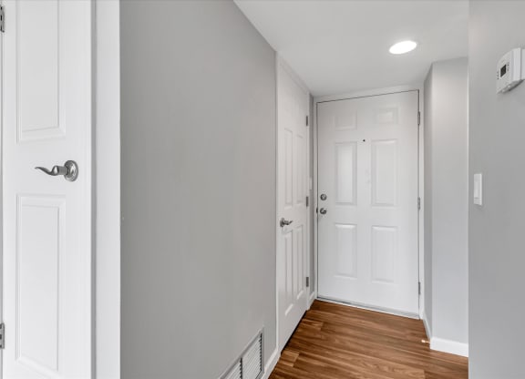 Entryway hallway with coat closet