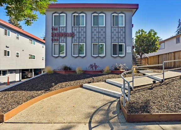 a building with a playground in front of it