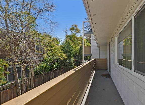 a long porch with a large window