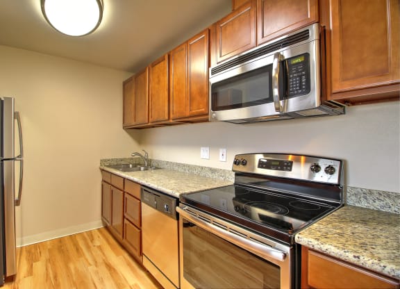 Kitchen gallery with appliances at Madison Place, San Mateo, CA