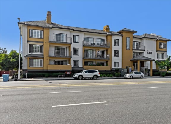 A large apartment building with the number 540 on it.