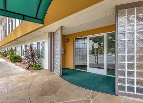 Front controlled access entrance doors