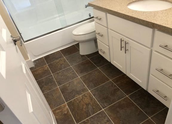 a bathroom with a toilet and a sink