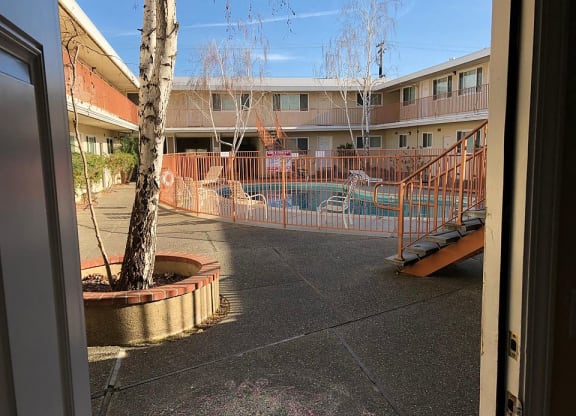 a view of a swimming pool from a door