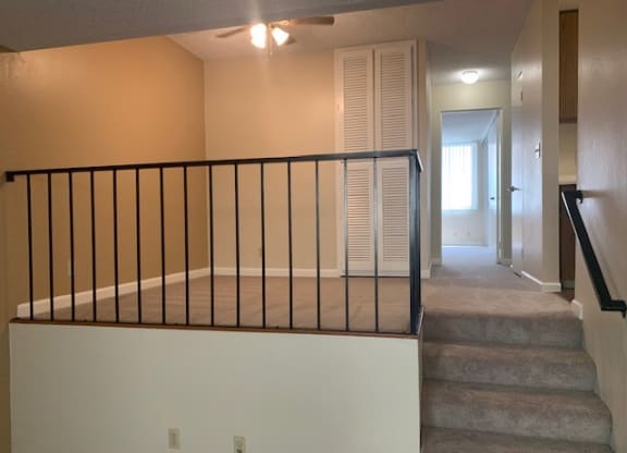 a staircase in an empty house with stairs