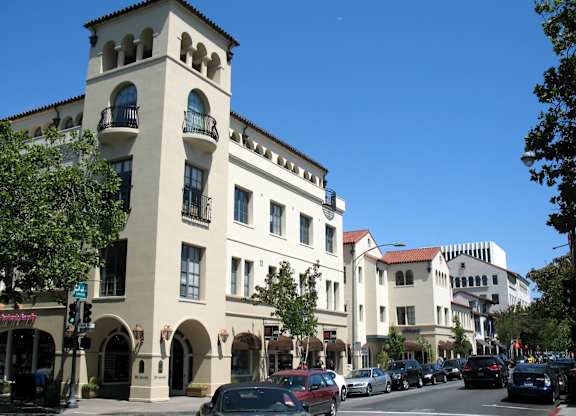 a building on the corner of a city street