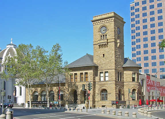a building with a clock tower on a city street