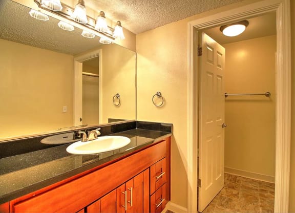 Bathroom With Adequate Storage at Sharon Grove Apartments, Menlo Park, California