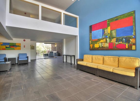 Yellow and blue sofa in lobby at The Luxe, California