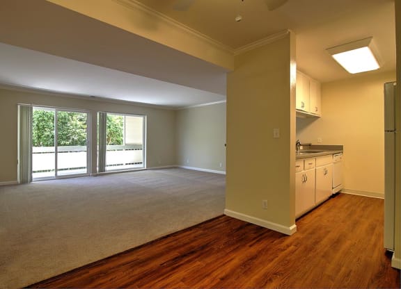 Living room with kitchen view at Wellesley Crescent, Redwood City, California