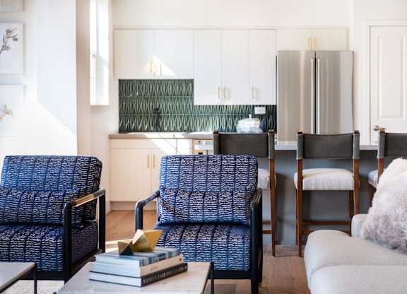 Open living and dining area with kitchen view at Rosemeade Apartments, Roseville, CA 95661