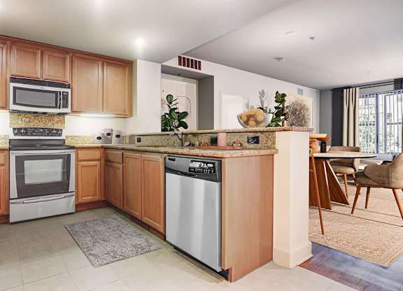 Kitchen with Wooden Cabinets at Renaissance Square, Concord, CA