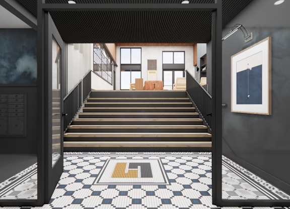 A hallway with a black and white checkered floor leads to a room with a couch and a painting.
