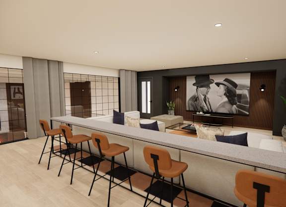 A modern room with a long table and chairs.