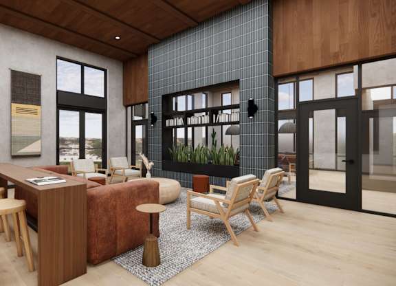 A modern interior with a long wooden table and chairs.