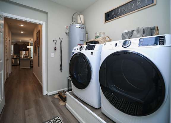 A laundry room with a washer and dryer.