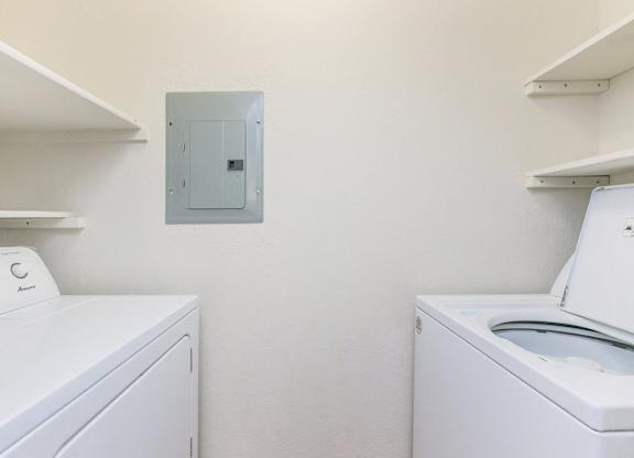 A laundry room with a washer and dryer.