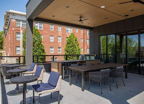 A patio with a table and chairs is shown.