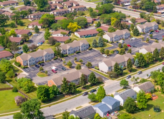 A residential area with houses and trees.