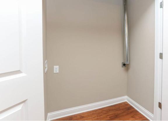 A white door is on the left and a white door is on the right.