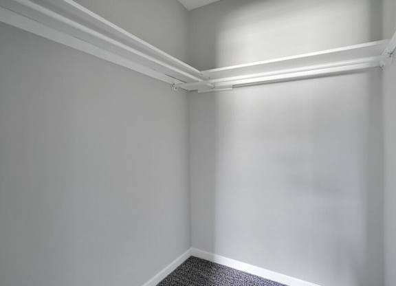 A white wall with a white ceiling and a white floor.