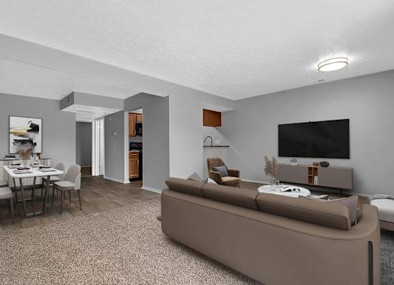 A living room with a brown couch and a dining table.