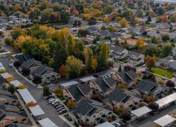 A suburban neighborhood with houses and trees.