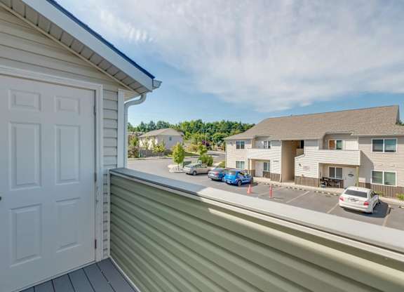 A white door is on the left side of the image.