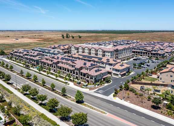 A large housing development with a road running through it.