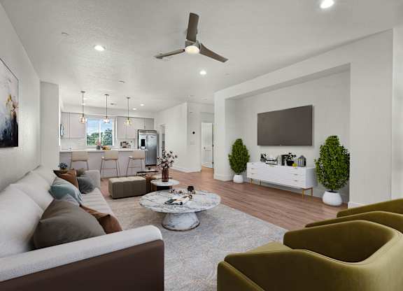a living room with couches and a coffee table