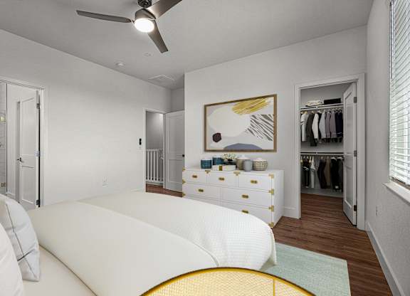 a bedroom with a large bed and a closet