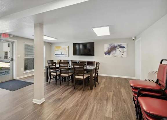 Room with Long Table and Chairs at Villages at Gateway, Colorado, 80239