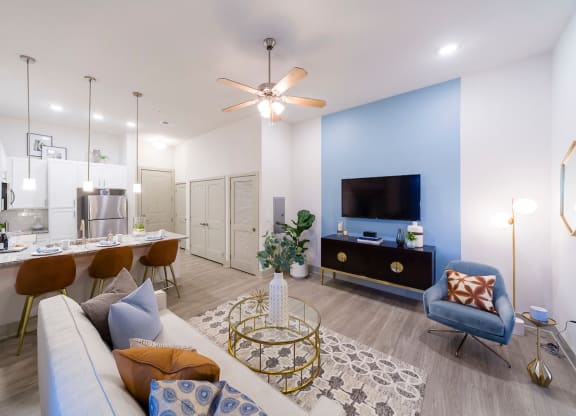 Contemporary apartment living area with kitchen island at Ciel Luxury Apartments, Florida, 32246