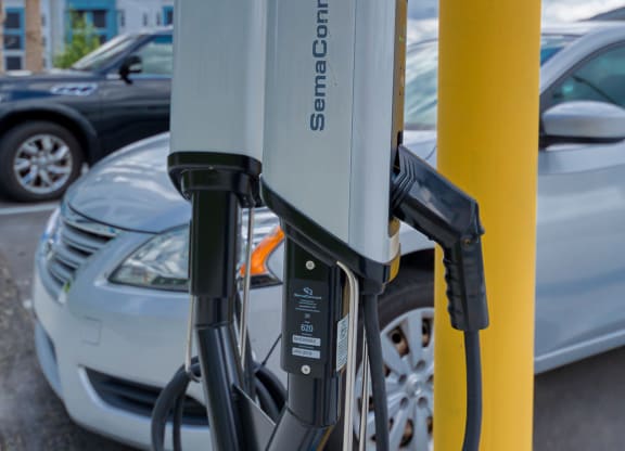 Electric vehicle charging station with multiple ports at Ciel Luxury Apartments, Jacksonville