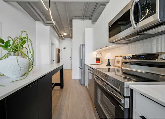 Modern Kitchen with black appliances at Richmond Square, London, ON, N6A 5M8