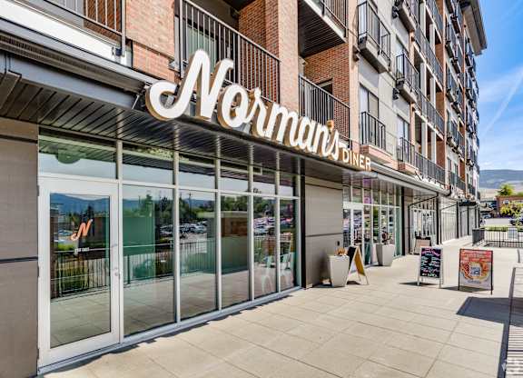 The exterior of a Normandi's Diner with a clear blue sky in the background.