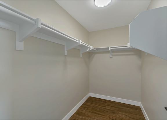 A room with a white ceiling and a white wall with a white floor.