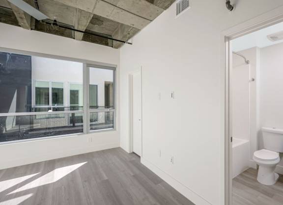 Living with open door to bathroom